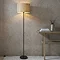image of woven seagrass lamp with black steel base