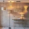 wide image of seagrass lighting range in a room, including floor lamp, table lamp and wall light