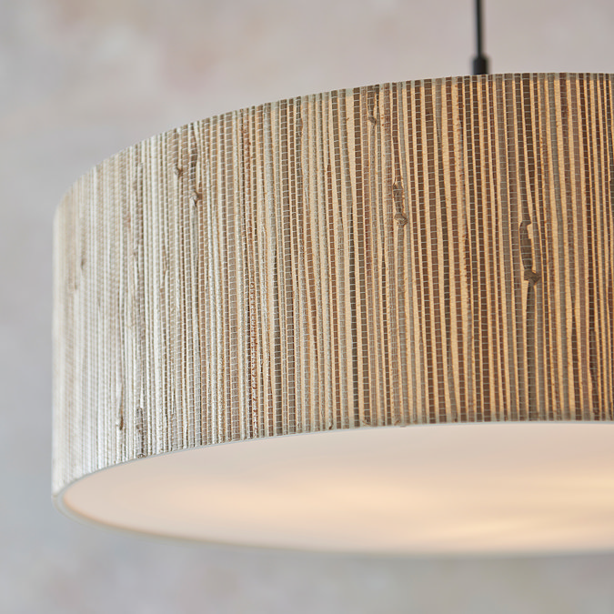close up on woven seagrass lamp in a natural colour