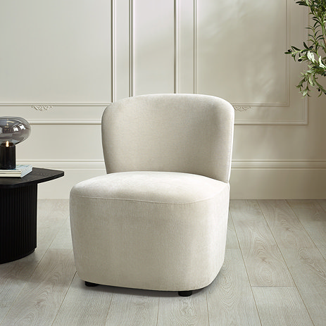 image of cream upholstered chair with deep seat, on grey flooring