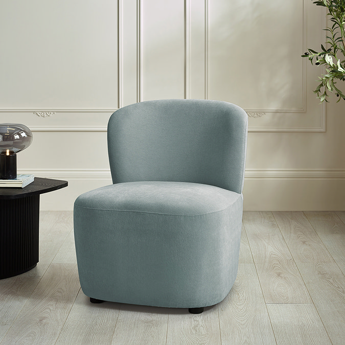 image of blue chenille accent chair with deep seat, on light grey flooring