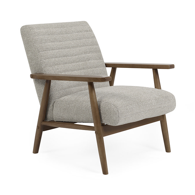 image cut out on white background of upholstered sand coloured accent chair with warm brown arms and legs