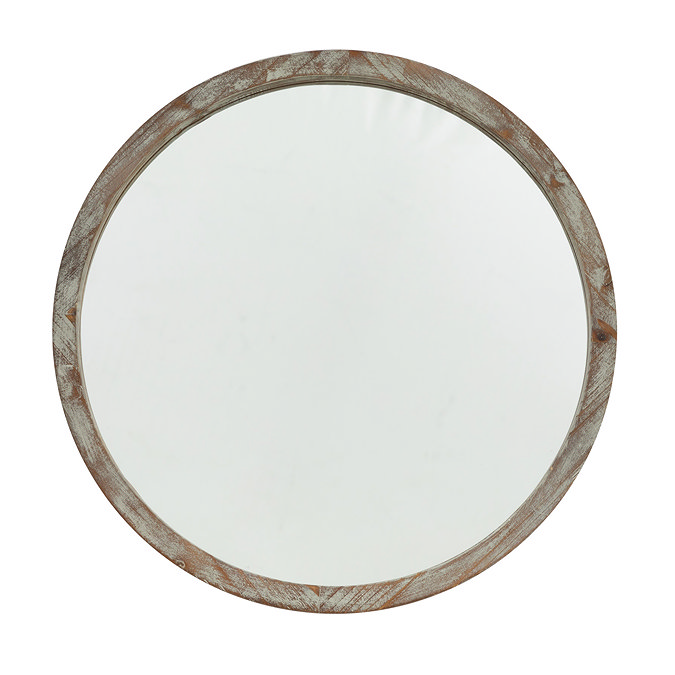 image cut out on white background of round weathered brown mirror