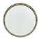 image cut out on white background of round weathered brown mirror