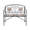 image cut out on white background of wrought iron 2 seat bench with mosaic circles for seating