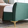 close up image on bottom half of emerald green velvet bed
