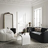 wide image of ivory boucle swivel chair in living room