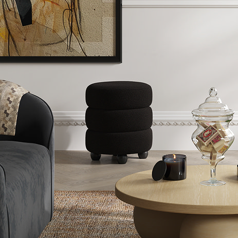 image of black boucle pouffe in living room