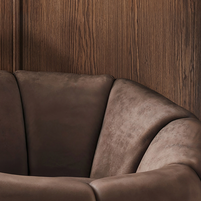 close up image of brown velvet material of accent chair