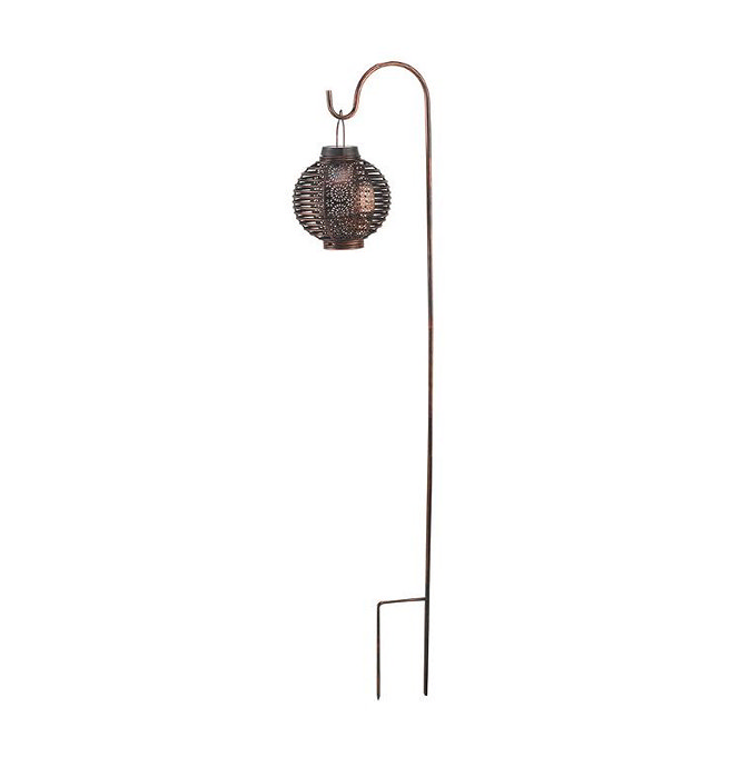 image cut out on white background of bronze coloured lantern on shepherd's crook