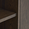 close up on dark oak wood grain of media tv unit