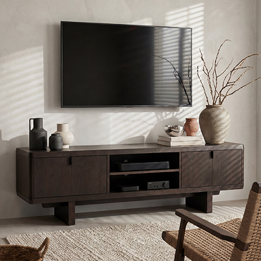 close up image of dark oak tv unit with folding doors, highlighting subtle metal handle pull