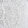close up on cream linen texture of bed headboard