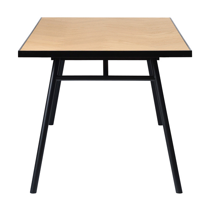 front on image cut out on white background of herringbone light oak dining table with sleek black legs