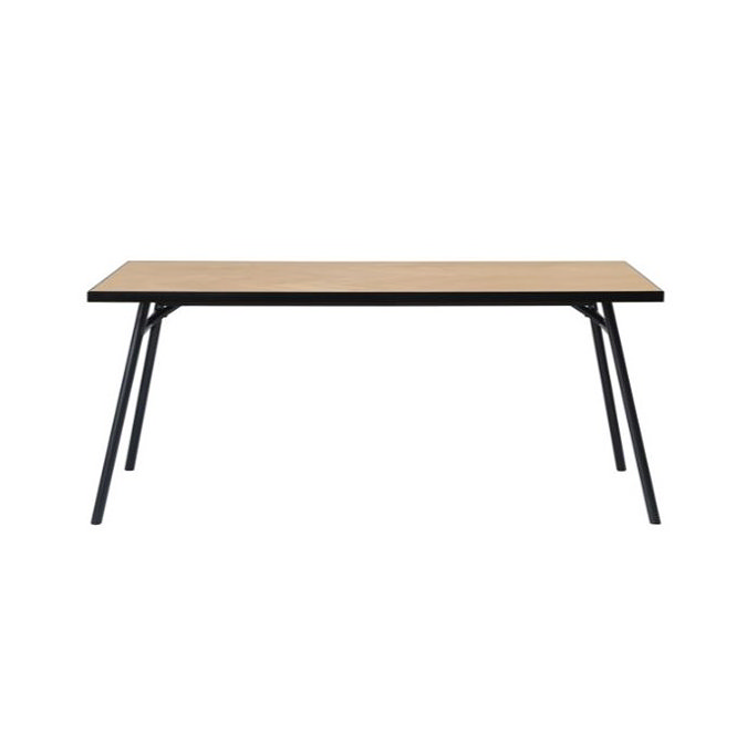 image cut out on white background of light oak dining table with black legs