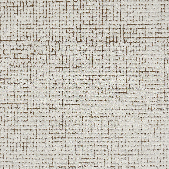 close up swatch image of distressed brown and ivory rug