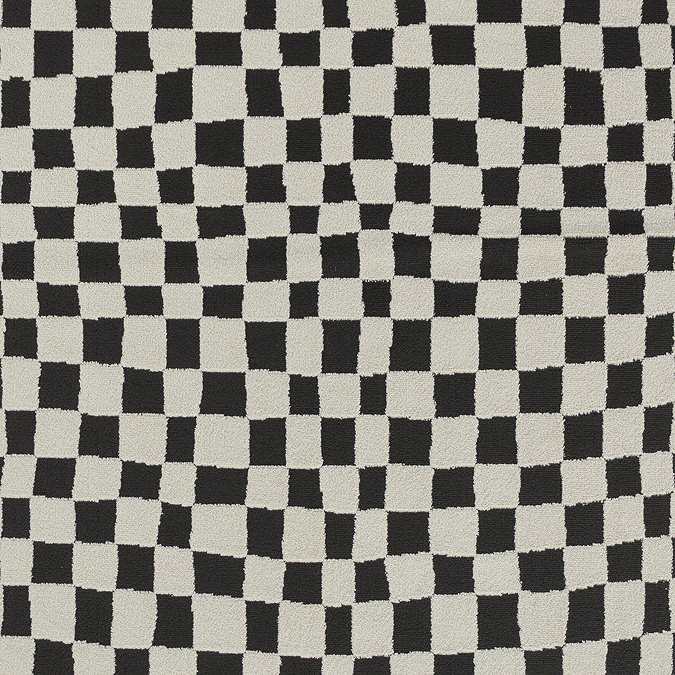 close up swatch image of ivory and black checkered abstract soft rug