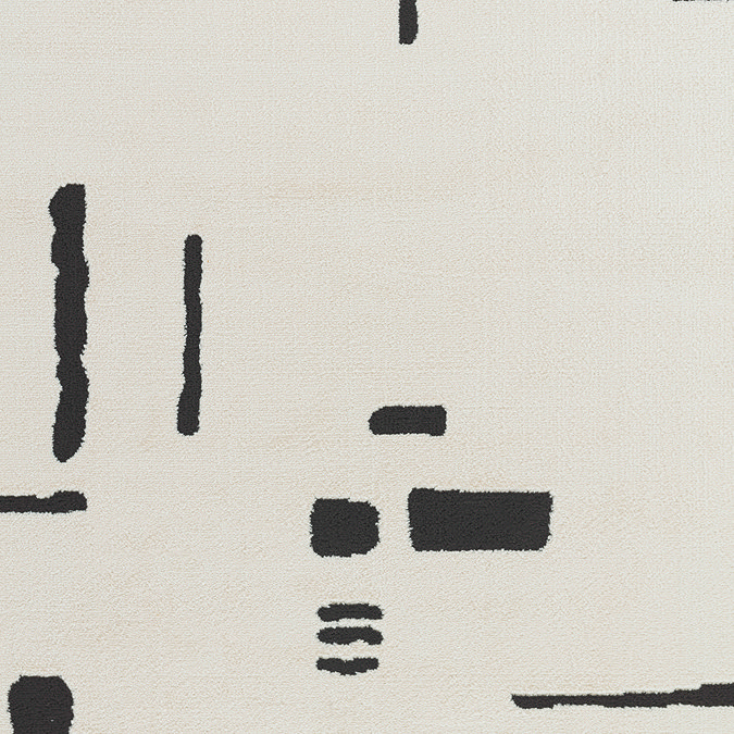 close up swatch image of ivory rug with abstract black patterns