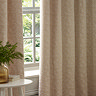 Galaxy Eyelet Curtains in Blush close up image of them hanging over a window