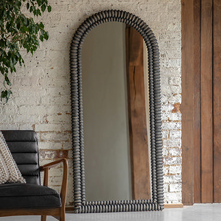image of large arched wooden black freesanding mirror