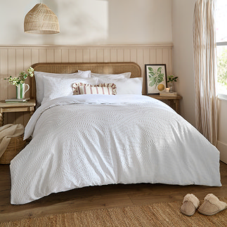 georgia white on bed image 1