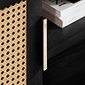 close up on rattan detail of left door of black tv unit