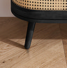 close up image of black legs of sideboard