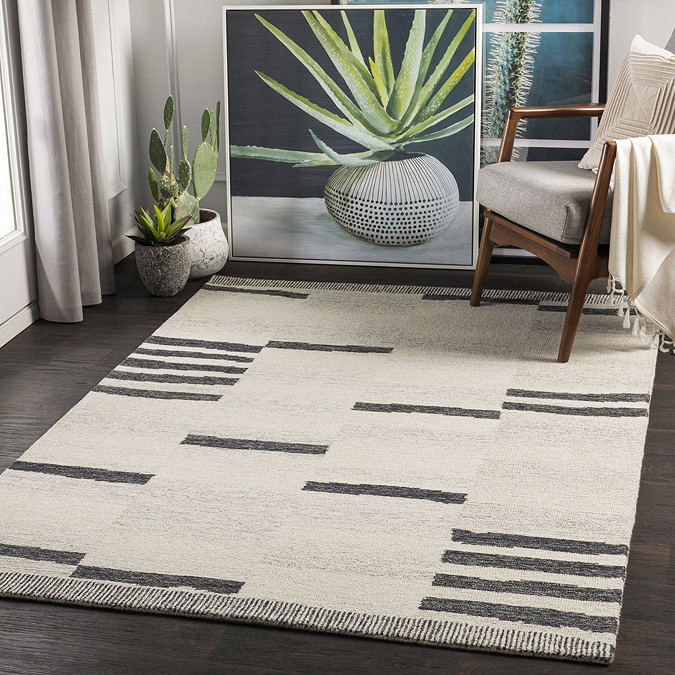 image of cream wool rug with different coloured lines