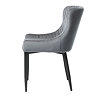 side on image cut out on white background of grey velvet harlequin stitched dining chair with black legs
