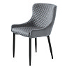 image cut out on white background of grey velvet dining chair with harlequin stitching on the inner seat and back