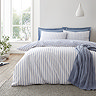 Hampton stripe duvet cover set in blue on bed image 1