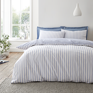 Hampton stripe duvet cover set in blue on bed image 1