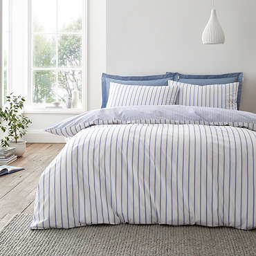 Hampton stripe duvet cover set in blue on bed image 1
