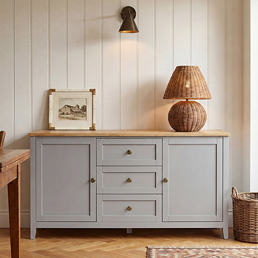 close up image of large sideboard with 2 doors and 3 drawers