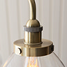 close up image on antique brass fixture of industrial bar lights