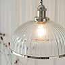 close up image on ribbed glass pendant light shade, focus on texture