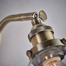 close up image of antique brass fixture of wall light