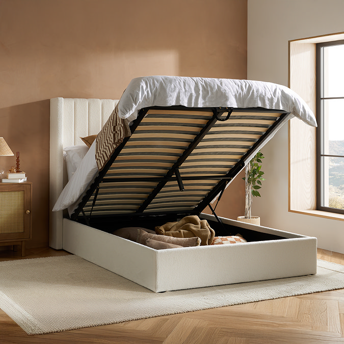 image of ottoman bed with mattress lifted up to reveal storage compartment underneath