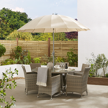 image of ecru parasol in light brown table, shade tilted to show adjustable top