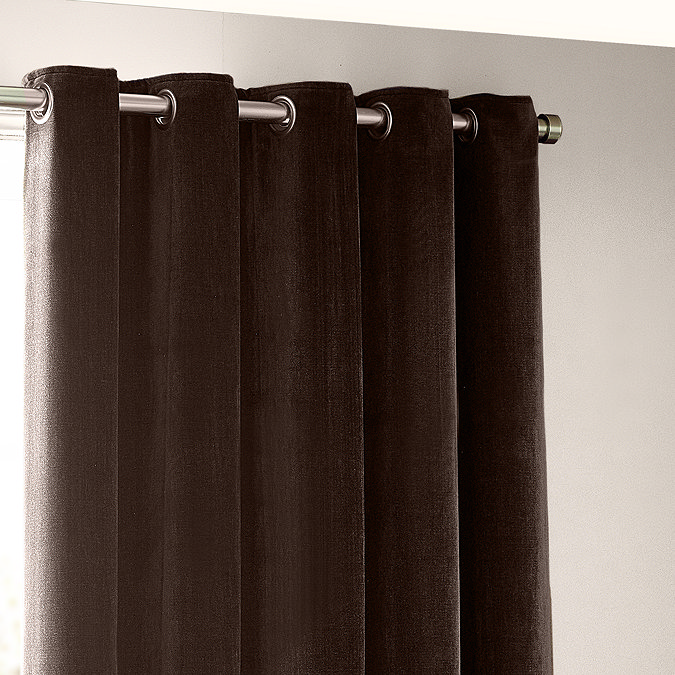 close up on top of chocolate brown curtains, highlighting eyelet design
