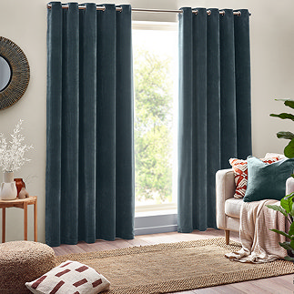 Heavy chenille marine eyelet curtain on window image 1