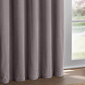 Heavy Chenille Mauve Eyelet curtains over a window close up image