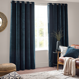 Heavy chenille curtain in navy on the window image 1