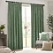 Heavy chenille eucalyptus curtains on window