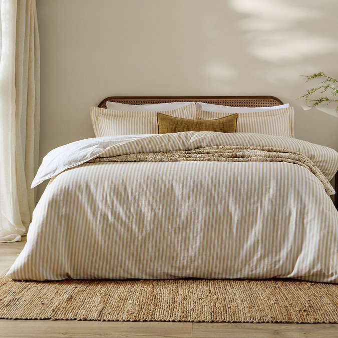 Hebden duvet cover yellow on bed image 1