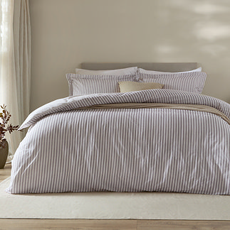 Hebden Duvet cover in mauve on bed image 1