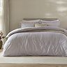Hebden Duvet cover in mauve on bed image 1