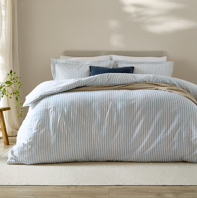 Hebden Mineral Blue Duvet Cover Set on bed image 1