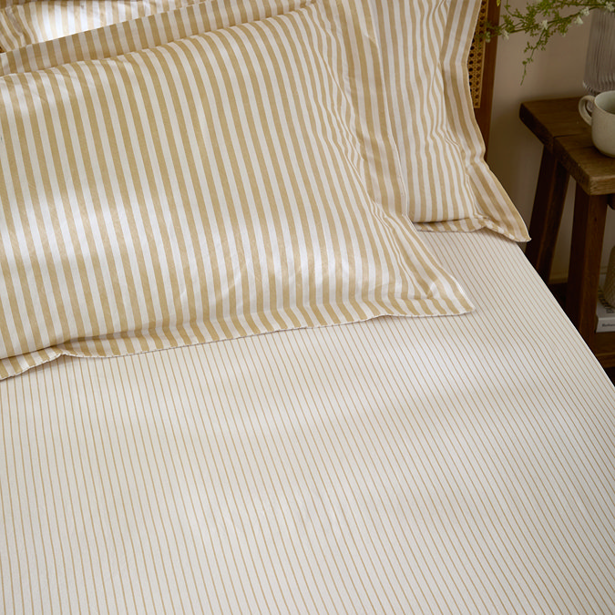 Hebden sheet in yellow on bed image 1