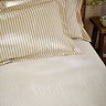 Hebden sheet in yellow on bed image 1